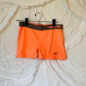 orange nike shorts